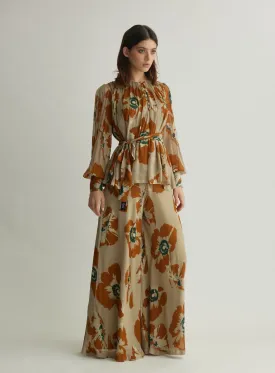 BEIGE AND RUST FLORAL FLARED PANTS