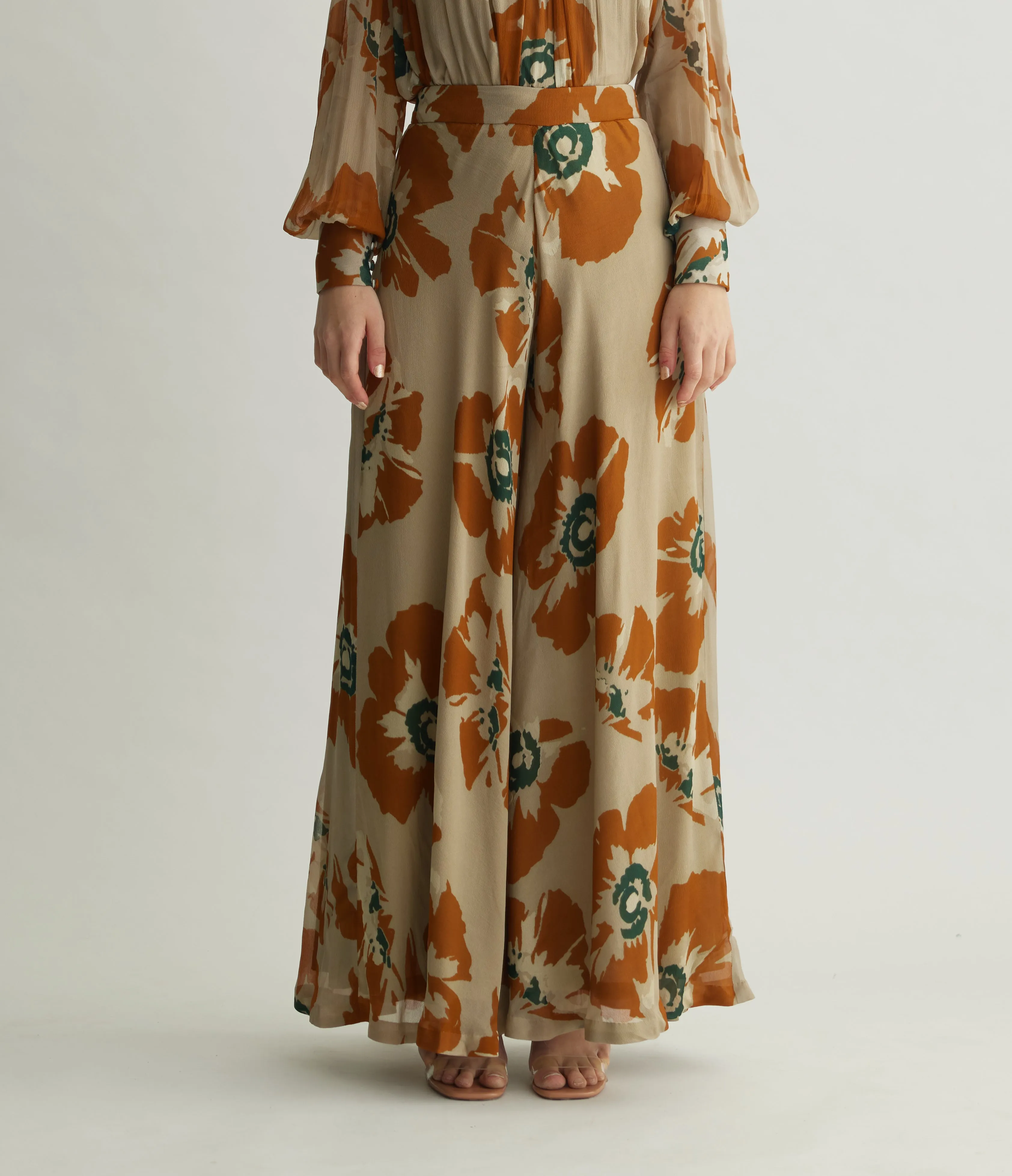 BEIGE AND RUST FLORAL FLARED PANTS
