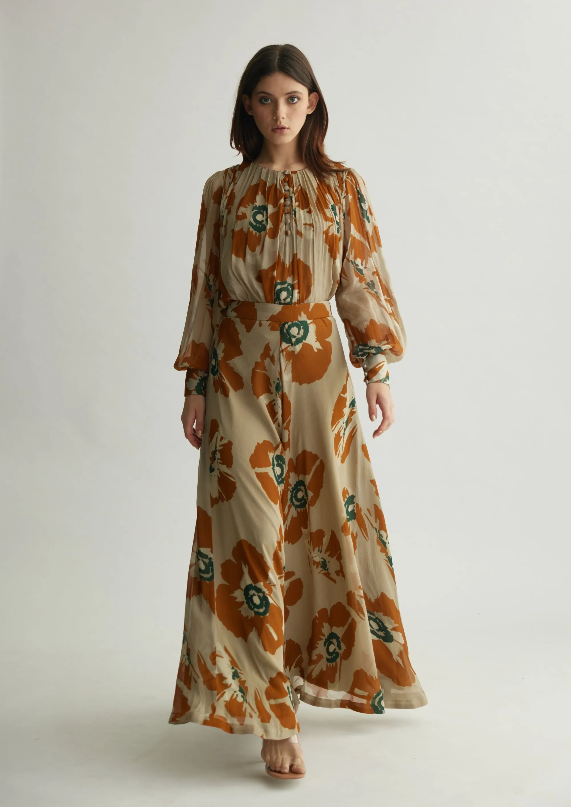 BEIGE AND RUST FLORAL FLARED PANTS