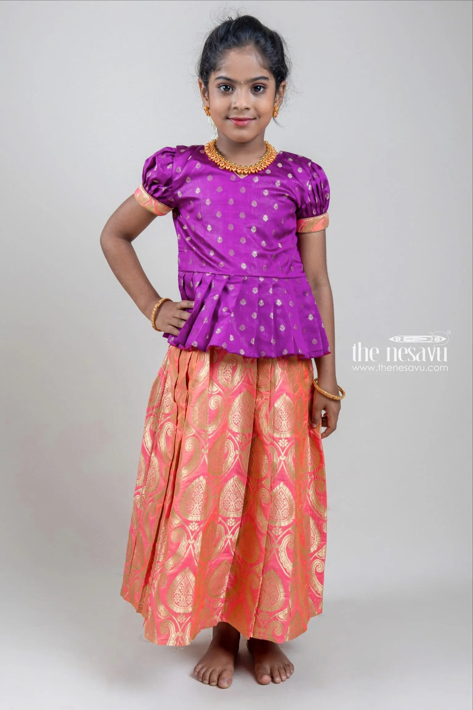 Zari Butta Printed Purple Silk Peplum Blouse with Knife Pleated Pink Pattu Pavadai for Girls